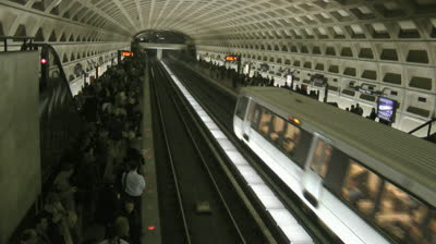 stock-footage-washington-dc-april-commuters-wait-in-overcrowded-metro-station-train-arrives
