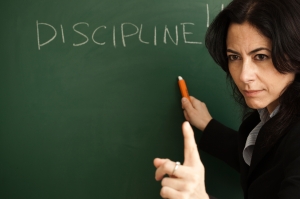 Teacher-with-Discipline-Written-on-Board-for-Blog